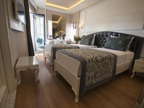 Habitación Doble Estándar - 1 o 2 camas del hotel Antusa Palace and Spa. Foto 2