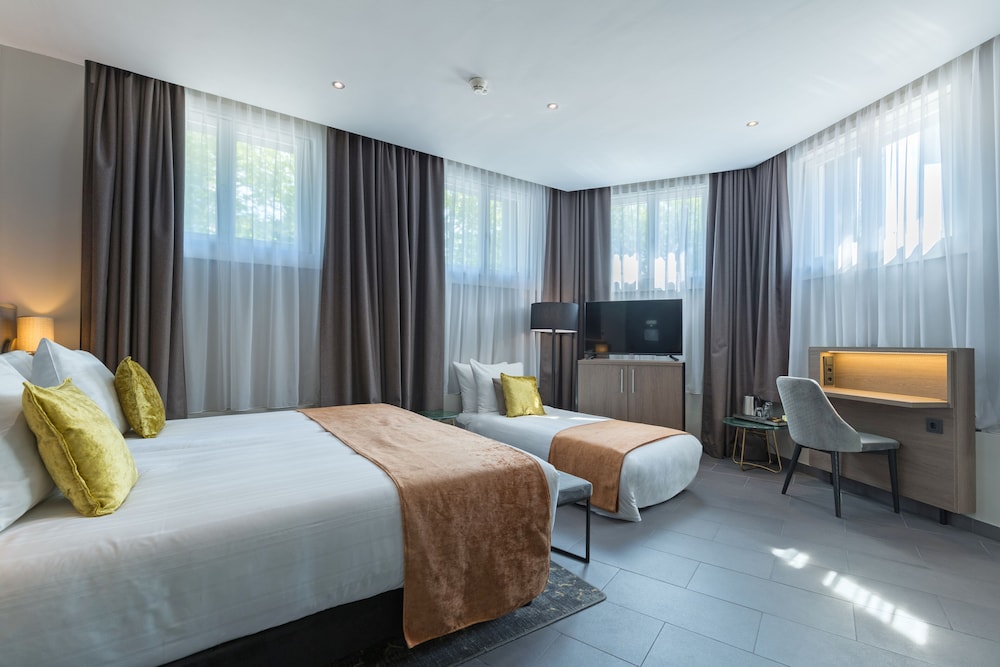 Habitación Confort (1 Double Bed 1 Single Bed) del hotel Leonardo Boutique Museumhotel. Foto 8