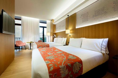 Habitación Triple del hotel Áurea Catedral By Eurostars Company