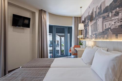 Habitación Triple del hotel Exe Liberdade