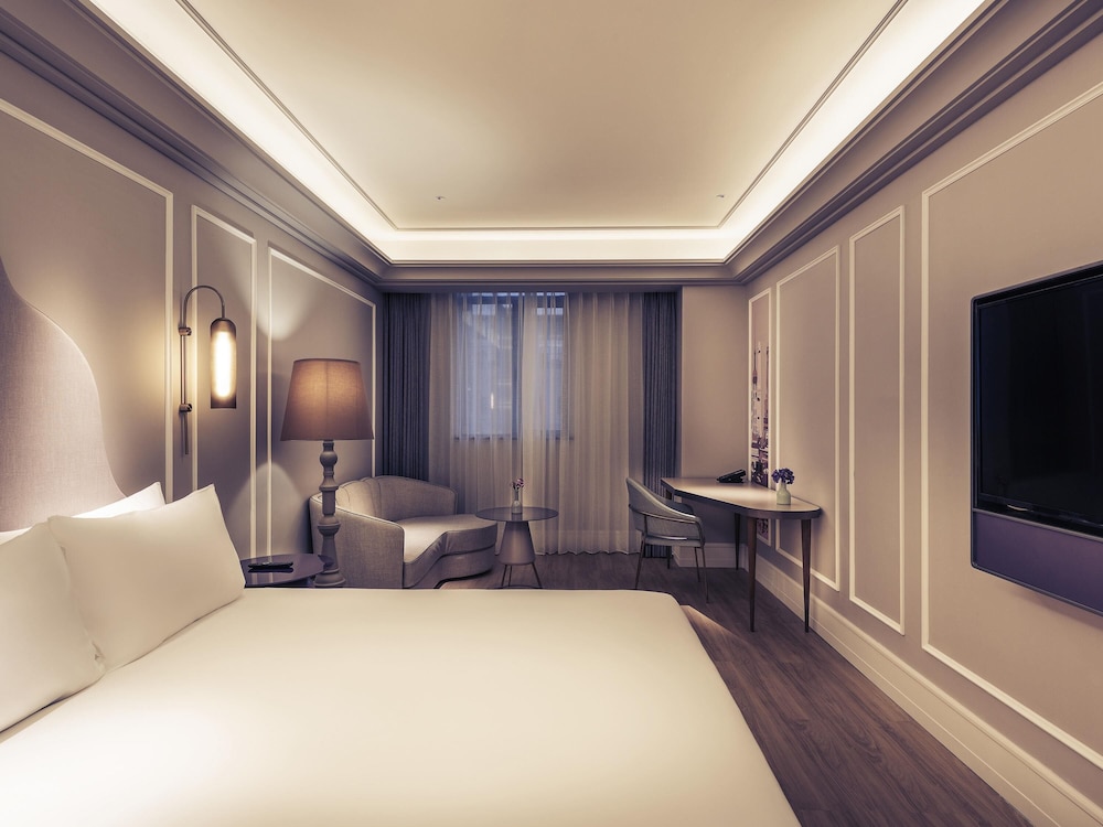 Habitación superior, 1 cama de matrimonio grande del hotel Mercure Shanghai Hongqiao Soho. Foto 1