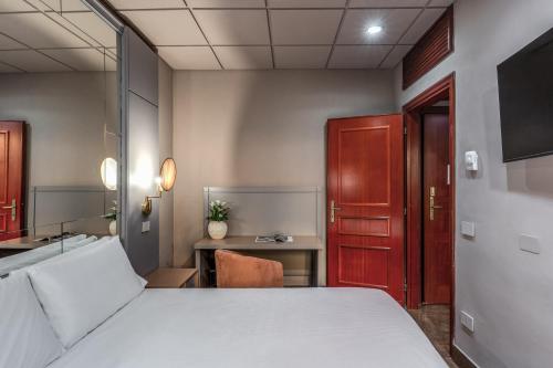 Habitación Doble Pequeña del hotel Madison. Foto 4