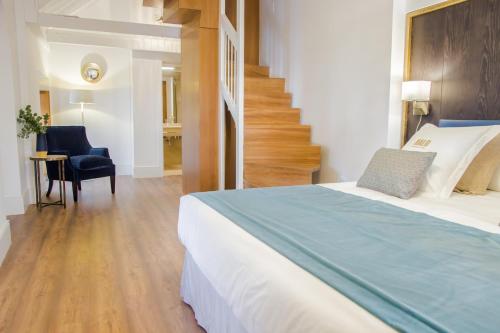 Habitación Doble Deluxe con terraza del hotel Halo Boutique. Foto 1