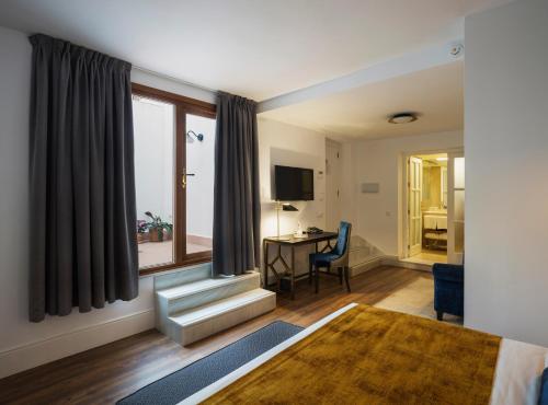 Suite Junior Premium con patio del hotel Halo Boutique. Foto 5