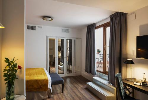 Suite Junior Premium con patio del hotel Halo Boutique. Foto 4