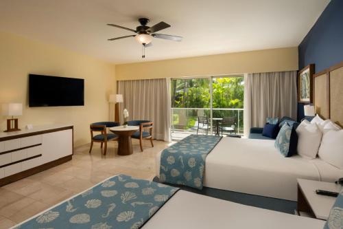 Suite Junior Premium con vistas tropicales del hotel Impressive Premium Punta Cana. Foto 1