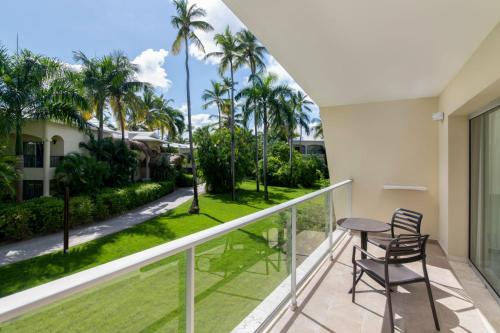 Suite Junior Premium con vistas tropicales del hotel Impressive Premium Punta Cana. Foto 2