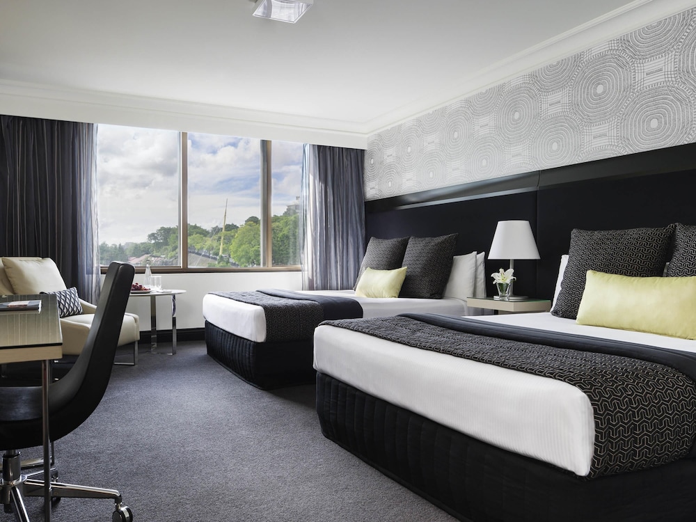 Habitación Deluxe Twin del hotel Pullman Brisbane King George Square. Foto 2