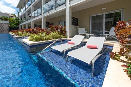 Habitación doble superior con acceso directo a la piscina del hotel Catalonia Royal La Romana - All Inclusive - Adults Only