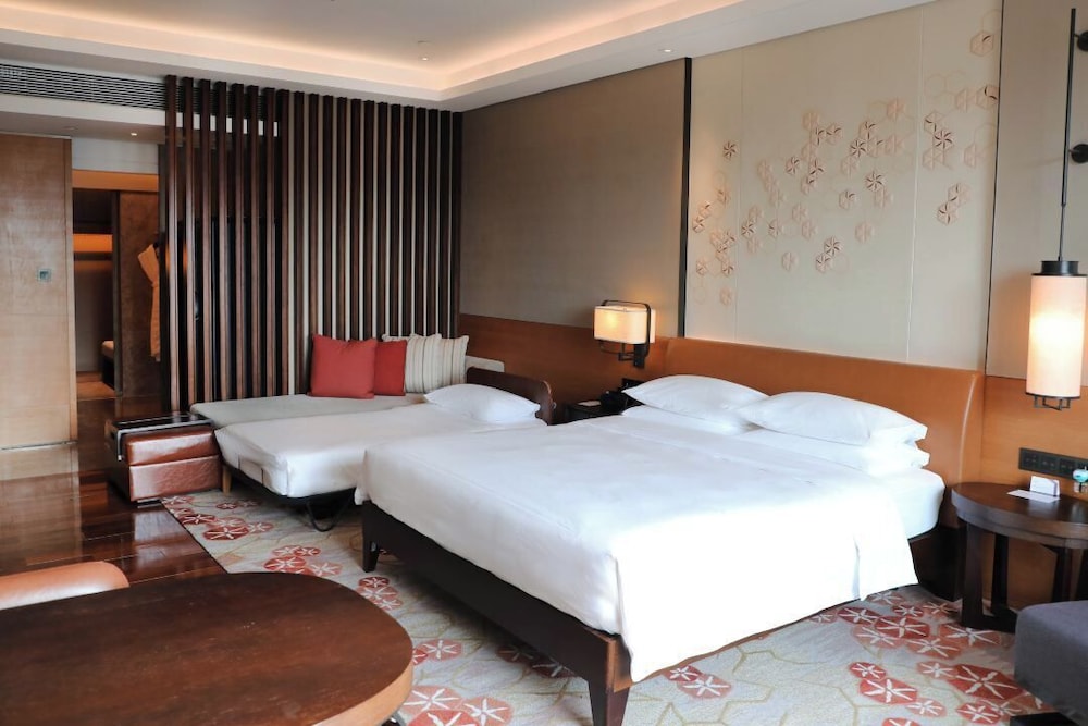 Habitación familiar (Deluxe) del hotel Hyatt Regency Xi An. Foto 1