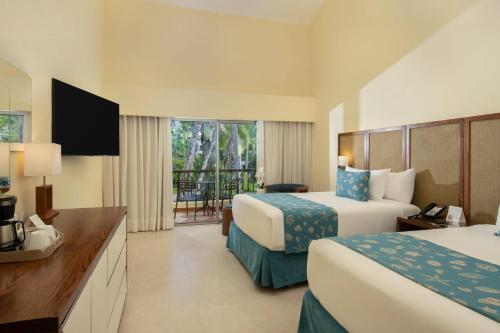 Habitación con vistas tropicales del hotel Impressive Punta Cana. Foto 2