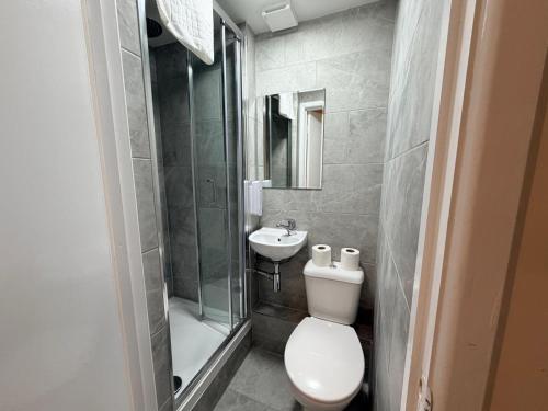 Habitación Triple del hotel King's Cross. Foto 29