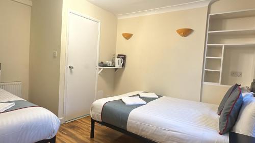 Habitación cuádruple del hotel King's Cross. Foto 1