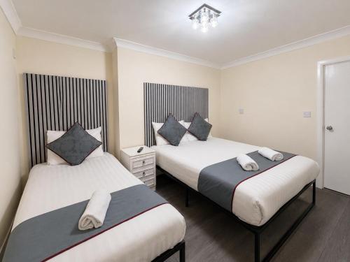 Habitación Triple del hotel King's Cross. Foto 5