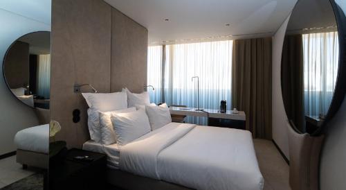Habitación Doble Deluxe del hotel Porto Royal Bridges. Foto 1