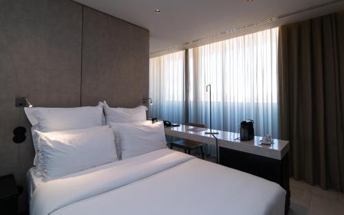 Habitación Doble Deluxe del hotel Porto Royal Bridges. Foto 5