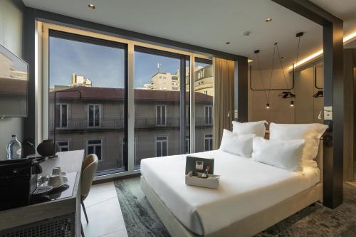 Habitación Doble Deluxe del hotel Porto Royal Bridges. Foto 6