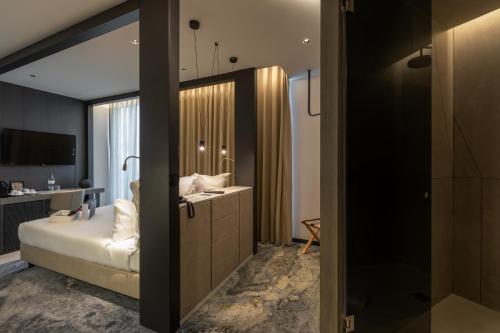Habitación Doble Deluxe del hotel Porto Royal Bridges. Foto 7
