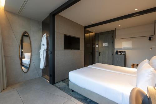 Habitación Doble Deluxe - 2 camas del hotel Porto Royal Bridges. Foto 2