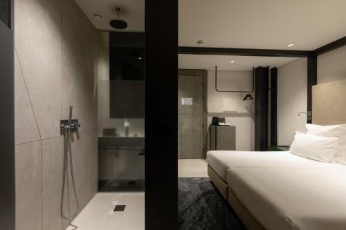 Habitación Doble Deluxe - 2 camas del hotel Porto Royal Bridges. Foto 4