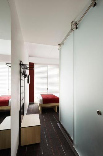 Habitación Pod - Cama doble grande del hotel Pod Times Square. Foto 3