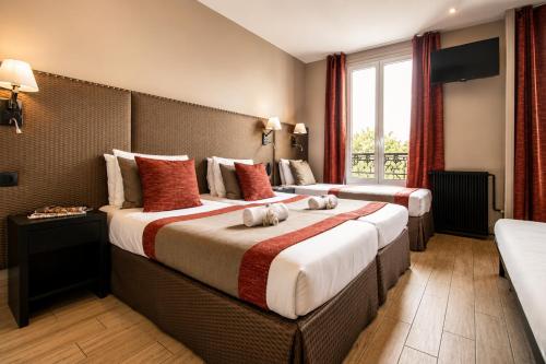 Habitación Quíntuple del hotel Migny Opera Montmartre. Foto 11