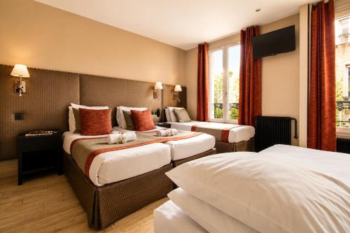 Habitación Quíntuple del hotel Migny Opera Montmartre. Foto 12
