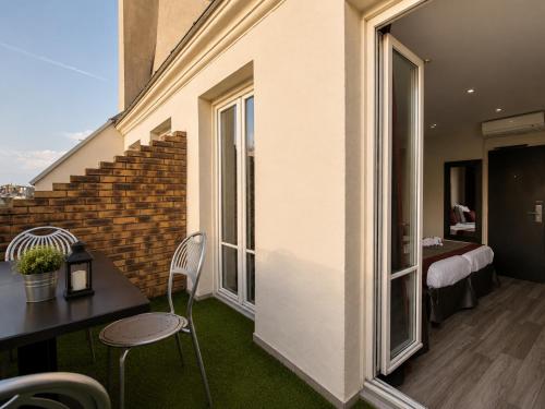 Habitación Triple del hotel Migny Opera Montmartre. Foto 5