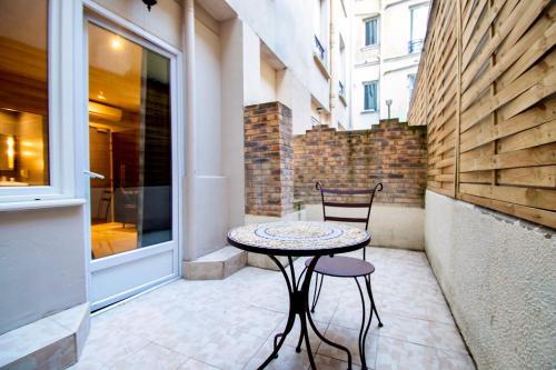 Habitación Doble - 1 o 2 camas del hotel Migny Opera Montmartre. Foto 16