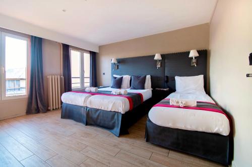 Habitación Triple del hotel Migny Opera Montmartre. Foto 7
