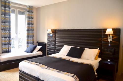 Habitación Triple del hotel Migny Opera Montmartre. Foto 9