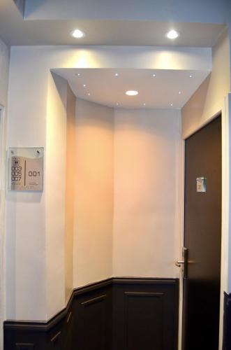Habitación Triple del hotel Migny Opera Montmartre. Foto 23