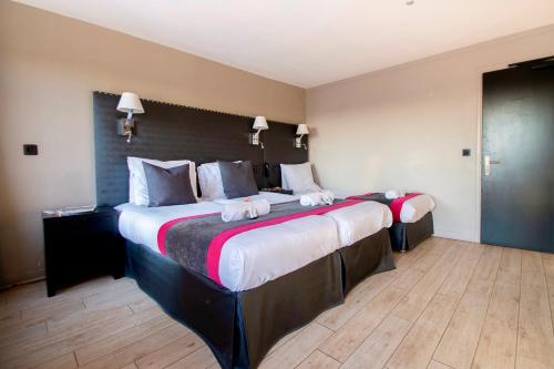Habitación Quíntuple del hotel Migny Opera Montmartre. Foto 10