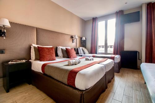 Habitación Quíntuple del hotel Migny Opera Montmartre. Foto 13