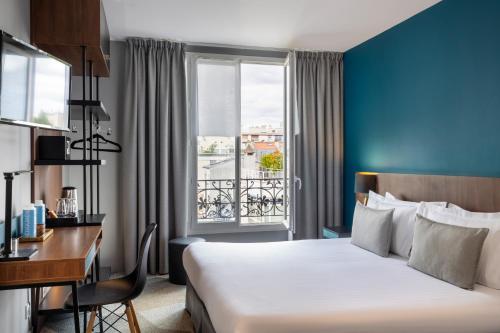 Habitación Deluxe con cama extragrande del hotel Montparnasse Alesia