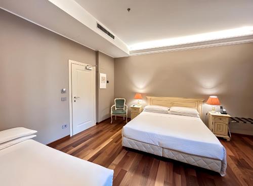 Habitación Triple Clásica del hotel Cavalletto E Doge Orseolo. Foto 1