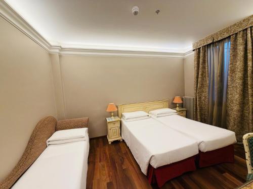 Habitación Triple Clásica del hotel Cavalletto E Doge Orseolo. Foto 3
