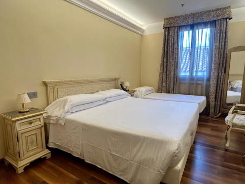 Habitación Triple Clásica del hotel Cavalletto E Doge Orseolo. Foto 3