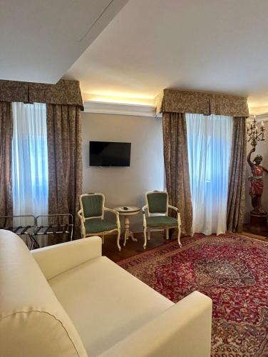 Habitación Doble Superior con vistas al canal del hotel Cavalletto E Doge Orseolo. Foto 1