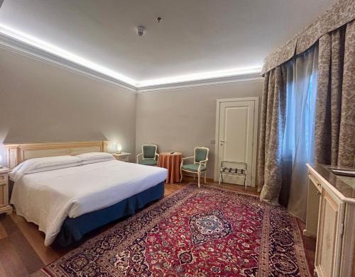 Habitación Doble Clásica con vistas al canal del hotel Cavalletto E Doge Orseolo. Foto 3