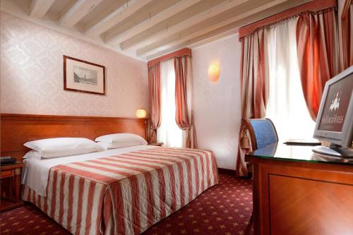 Habitación con 1 cama doble o 2 individuales - Anexo del hotel Cavalletto E Doge Orseolo. Foto 2