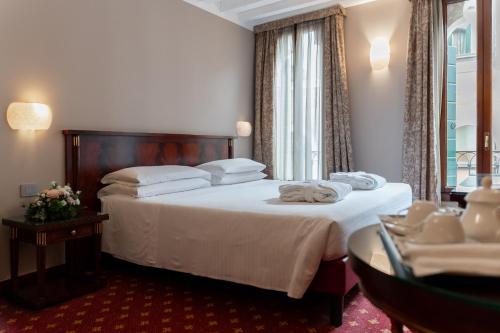 Habitación con 1 cama doble o 2 individuales - Anexo del hotel Cavalletto E Doge Orseolo. Foto 4