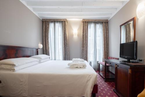 Habitación con 1 cama doble o 2 individuales - Anexo del hotel Cavalletto E Doge Orseolo. Foto 5