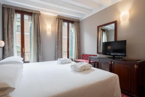 Habitación con 1 cama doble o 2 individuales - Anexo del hotel Cavalletto E Doge Orseolo. Foto 6