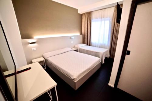 Habitación Triple del hotel Centrale. Foto 4