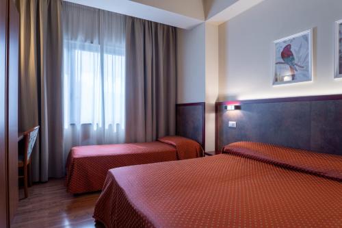 Habitación Triple del hotel Centrale. Foto 9