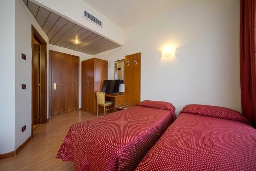 Habitación Cuádruple del hotel Centrale. Foto 4