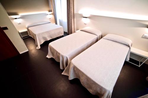 Habitación Cuádruple del hotel Centrale. Foto 5