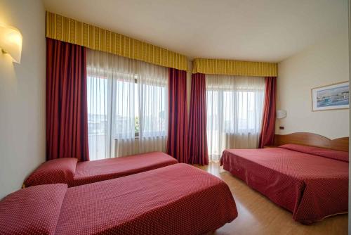 Habitación Cuádruple del hotel Centrale. Foto 6