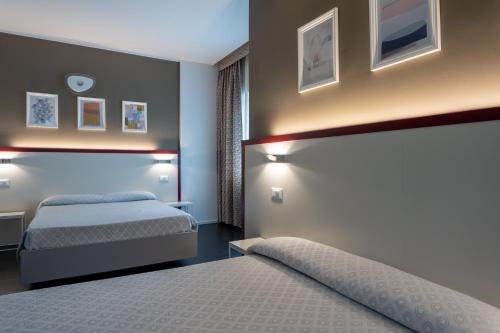 Habitación Cuádruple del hotel Centrale. Foto 7